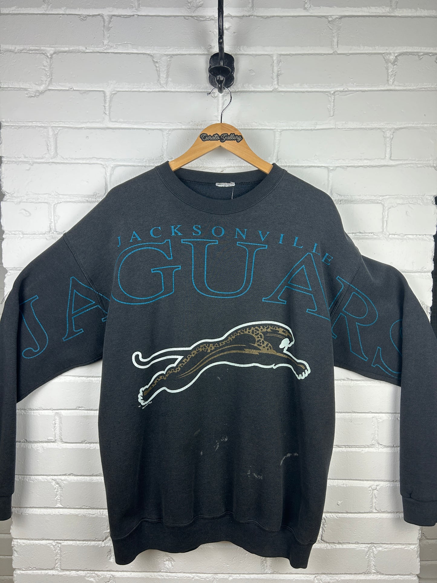Vintage 1993 Jacksonville Jaguar Arm Spell Out NFL Banned Logo Sweatshirt Size XL