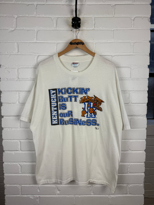 Vintage 90s Kentucky Wildcats Basketball NCAA Kickin Butt Is Our Business T Shirt Size XXL